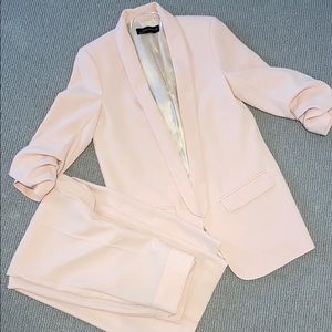 Pink blazer, high rise pants and top